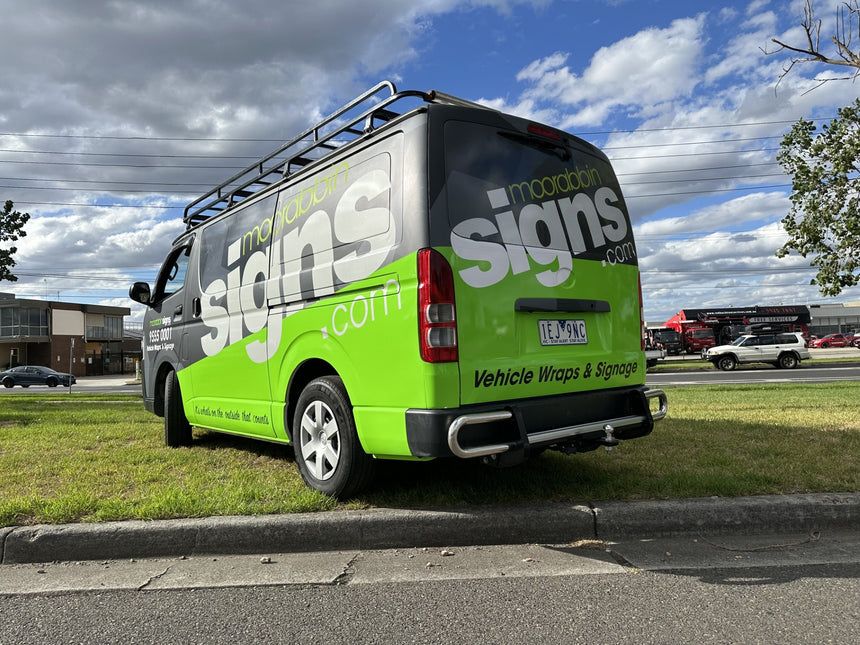 Satin lamimnated digitally printed graphics. Gloss green vinyl wrap. REFLECTIVE white vinyl for "signs.com" will definitely be seen at night.